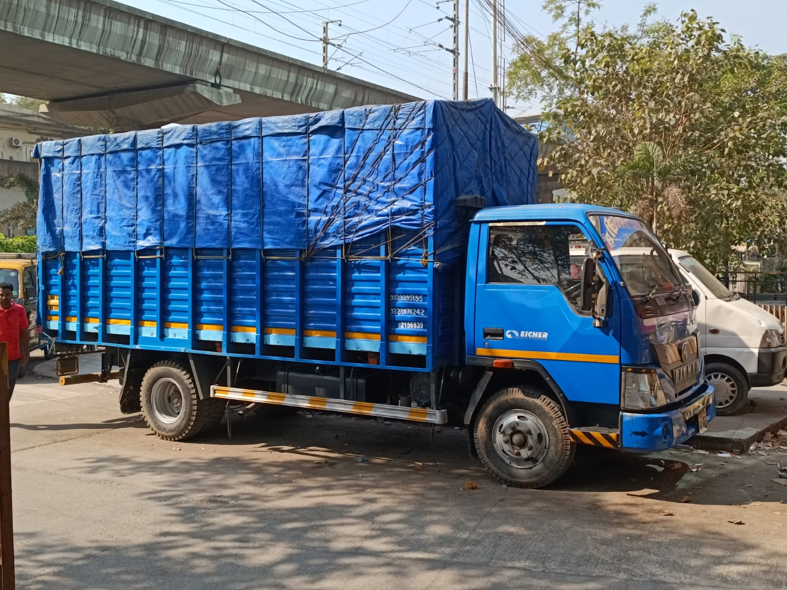 Govinda Tempo Service truck loaded and covered