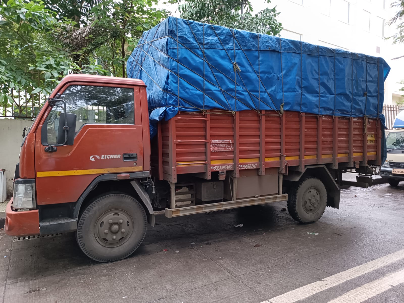 Govinda Tempo Service Eicher truck loaded for delivery