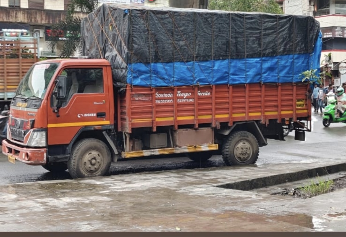 Fleet of Govinda Tempo Service trucks parked together